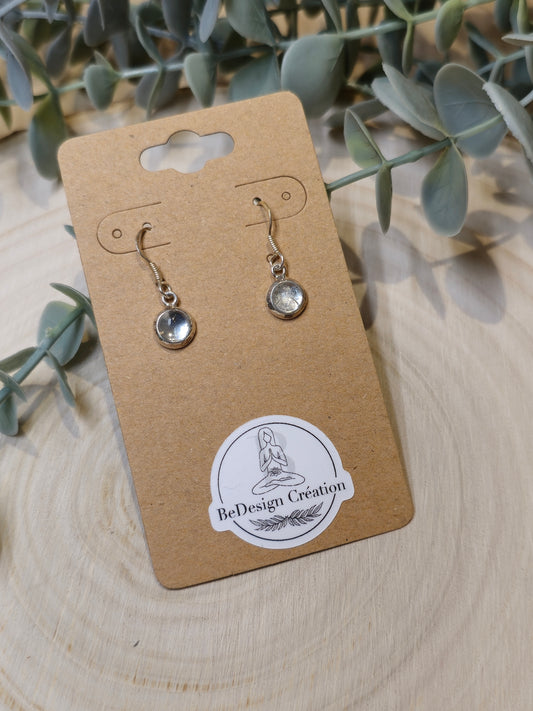 Boucles d’oreilles pendantes Topaze bleue