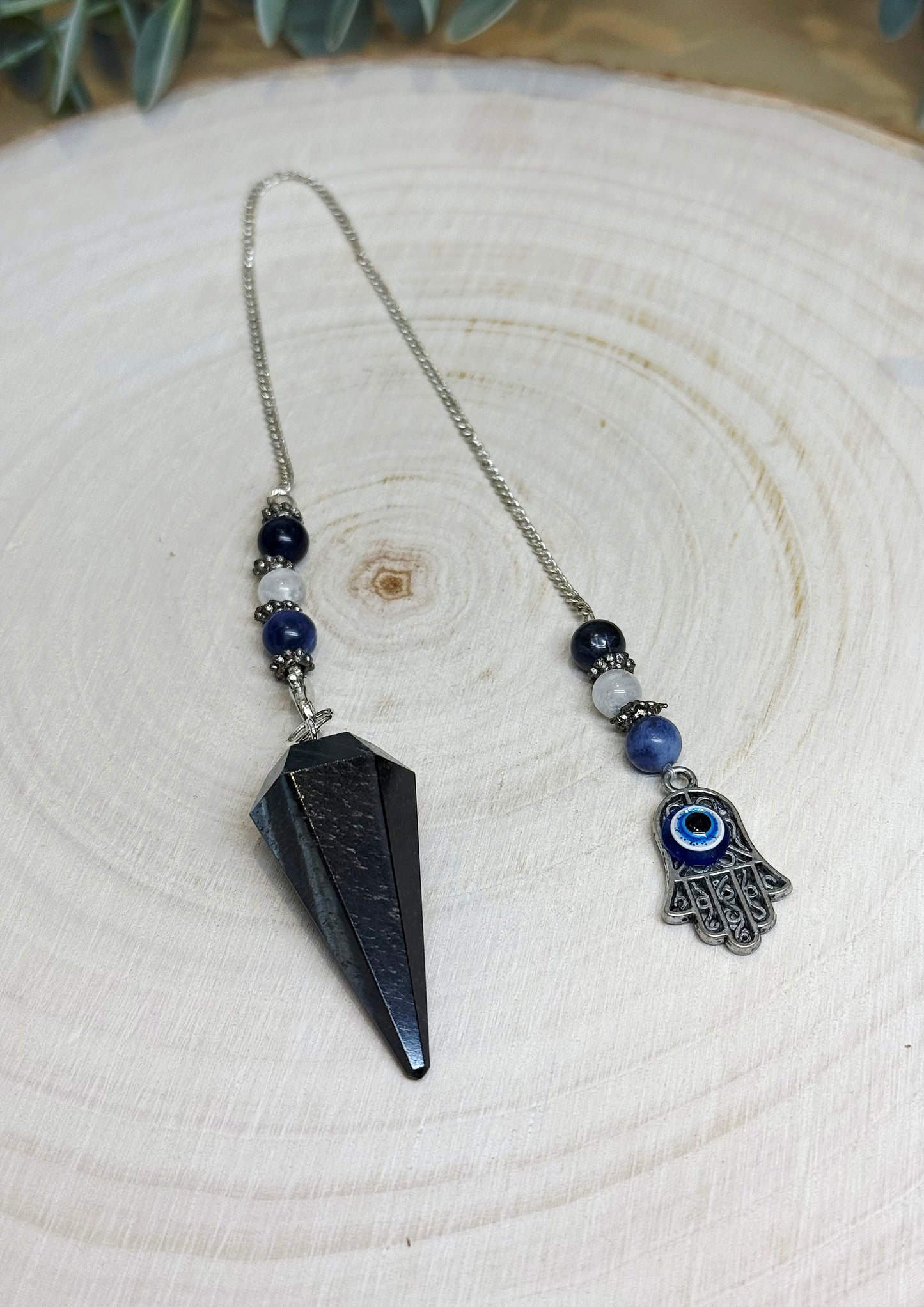 Pendule en Oeil de tigre bleu (Faucon)