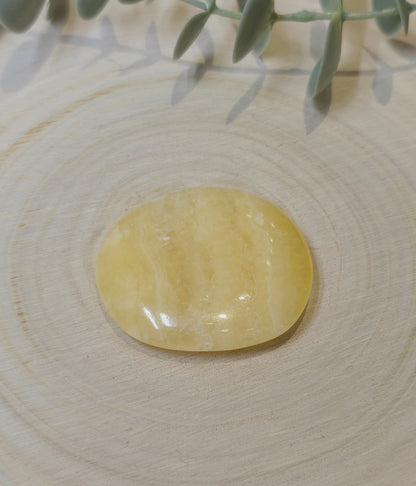 Pierre de paume mince Calcite jaune