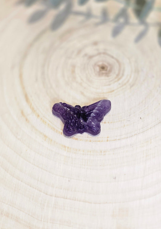 Papillon et fleurs en Améthyste