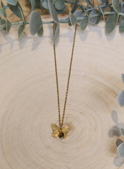 Collier Papillon et pierre gold